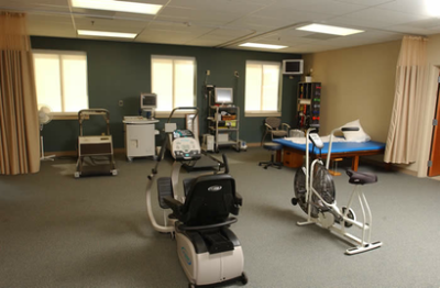 Cardiac Rehab exercise room showing exercise machines.