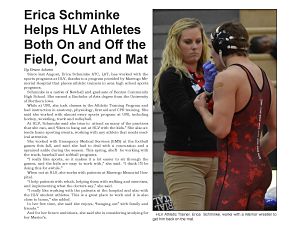 Picture of Erica Schminke helping male HLV Athlete.
