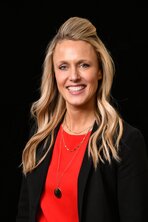 Natasha Hauschilt, Director of Ancillary Services and Organizational Performance smiling.